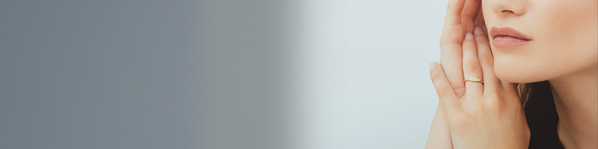 Fine geometric gold ring with diamonds worn by elegant woman, modern jewellery collection