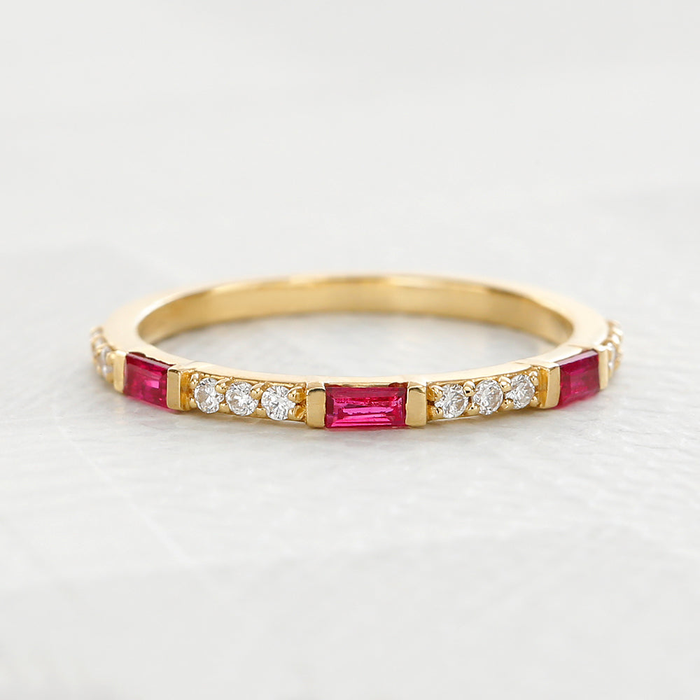 Moksha wedding ring in 18K Yellow Gold set with baguette cut diamonds by Mayuri