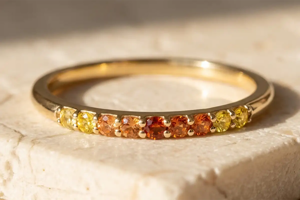 Kiran Sunset Sapphire ring in 18K yellow gold, gradient from orange to golden yellow