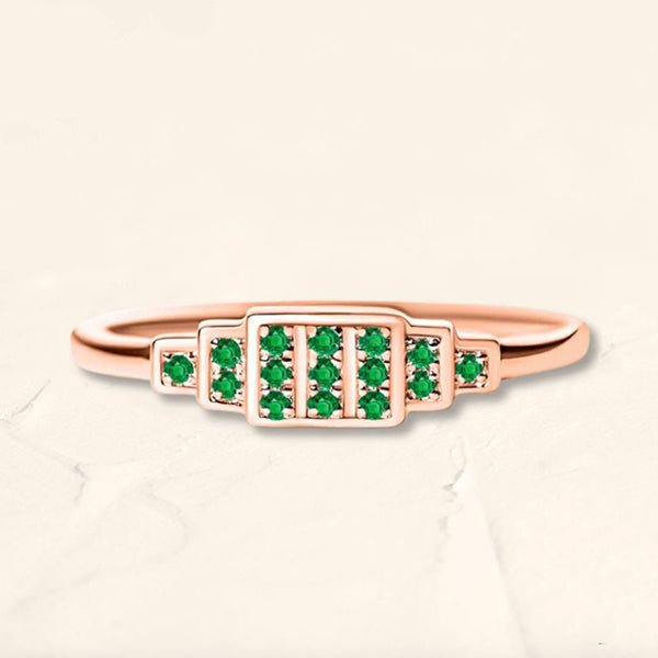 Brami ring in rose gold set with emeralds