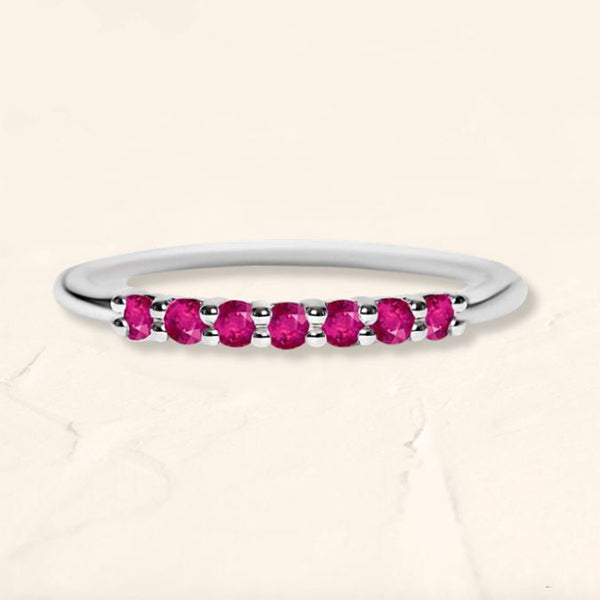 Vadha wedding band in white gold set with rubies