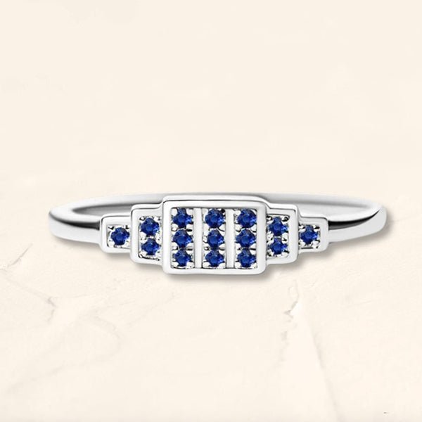 Brami XL geometric ring in white gold set with natural sapphires