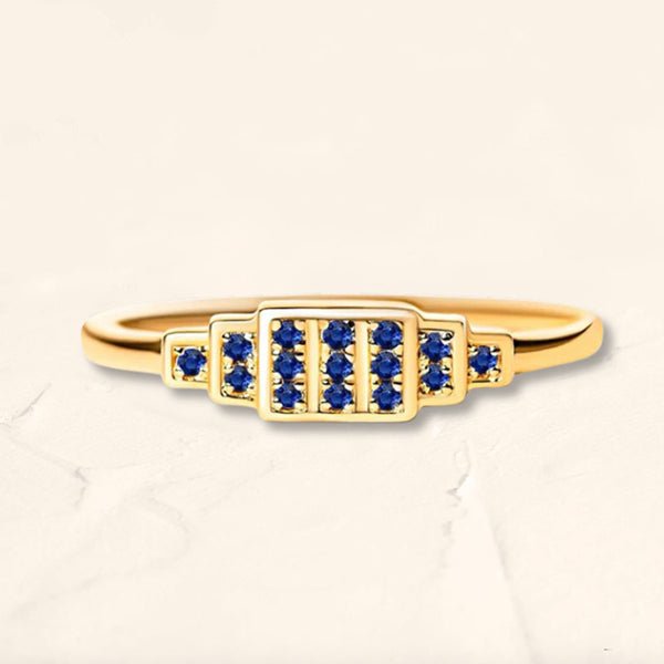 Brami XL geometric ring in yellow gold set with natural sapphires