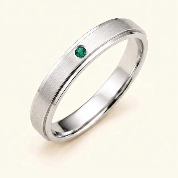 Dhruva emerald wedding band in 18k white gold for men, brushed band bezel setting