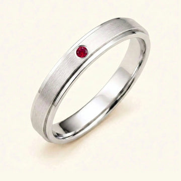 Dhruva 18K white gold ruby wedding ring, brushed bangle close-set
