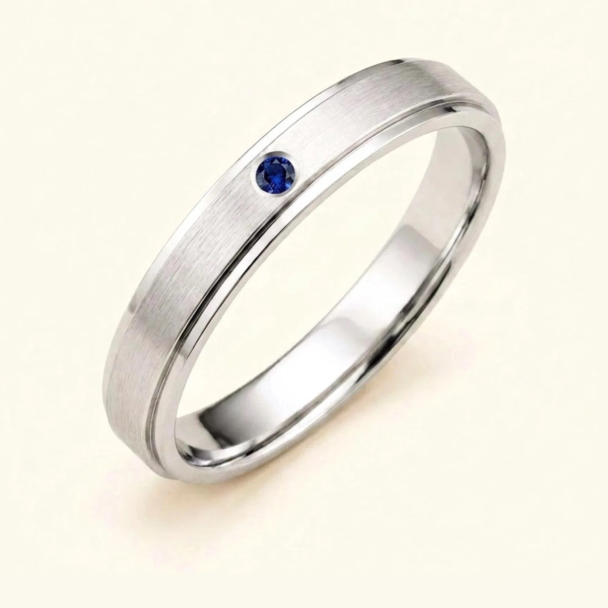Dhruva sapphire wedding band in 18k white gold for men, brushed band bezel setting