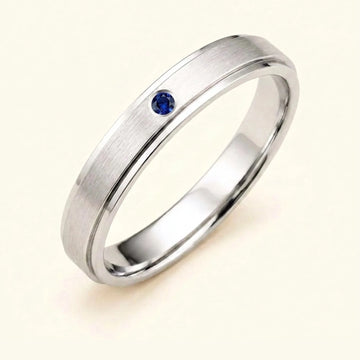 Dhruva sapphire wedding band in 18k white gold for men, brushed band bezel setting