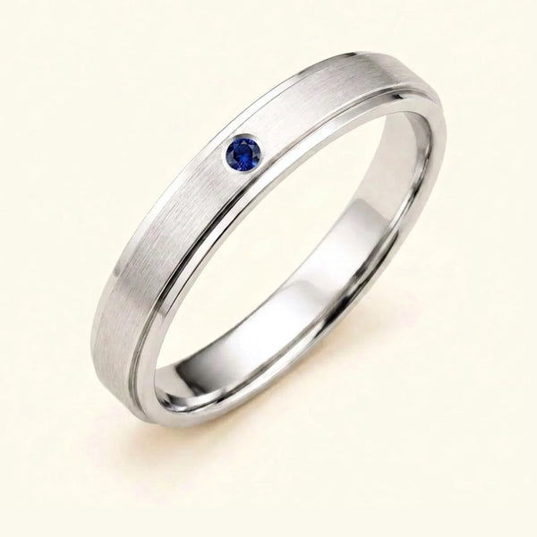 Dhruva sapphire wedding band in 18k white gold for men, brushed band bezel setting