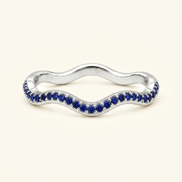 Thalassa wave wedding ring with sapphires in 18K white gold, half-eternity pavé set