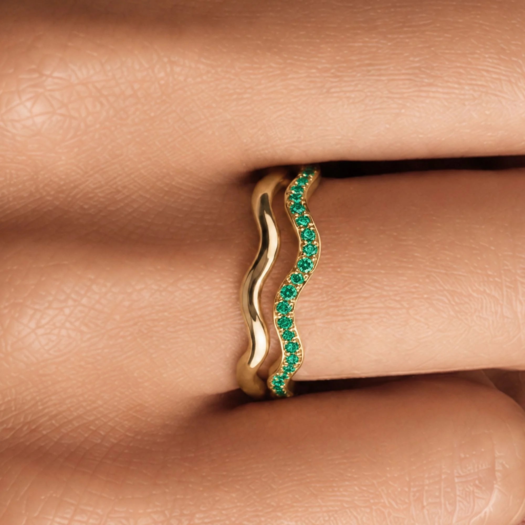 Thalassa wave wedding ring with emeralds worn as a duo, 18K yellow gold