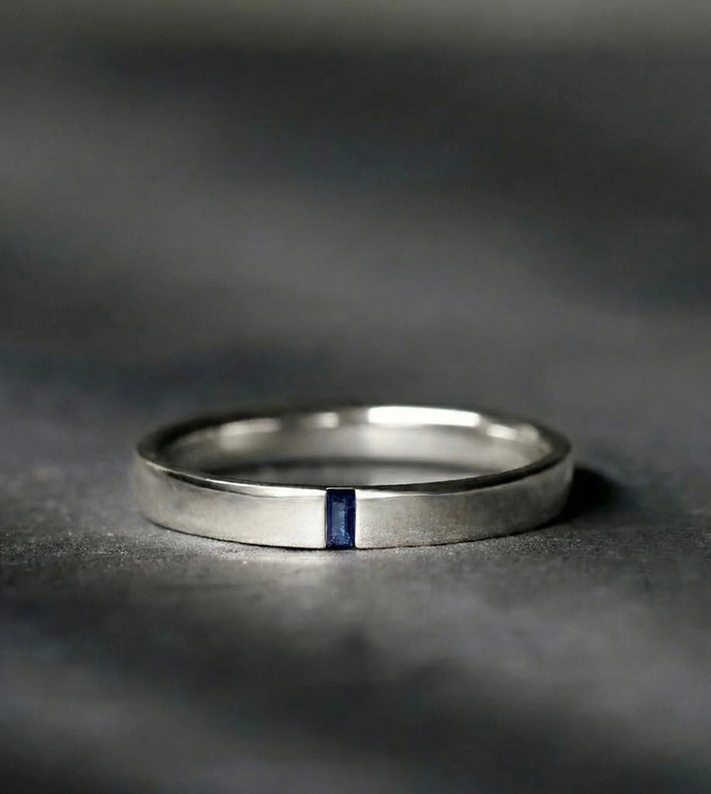 The Agni ring in white gold and Sapphire, a refined masculine design for men