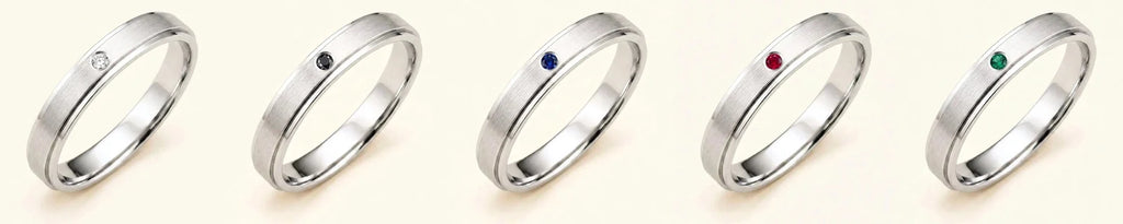 The Dhruva men's ring in 18ct white gold, available with diamond, black diamond, sapphire, ruby, and emerald