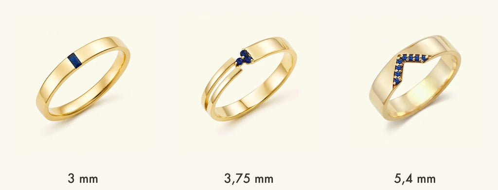 Three widths of Mayuri men's engagement rings in 18ct yellow gold: Agni 3 mm, Vibhu 3.75 mm, and Rudra 5.4 mm