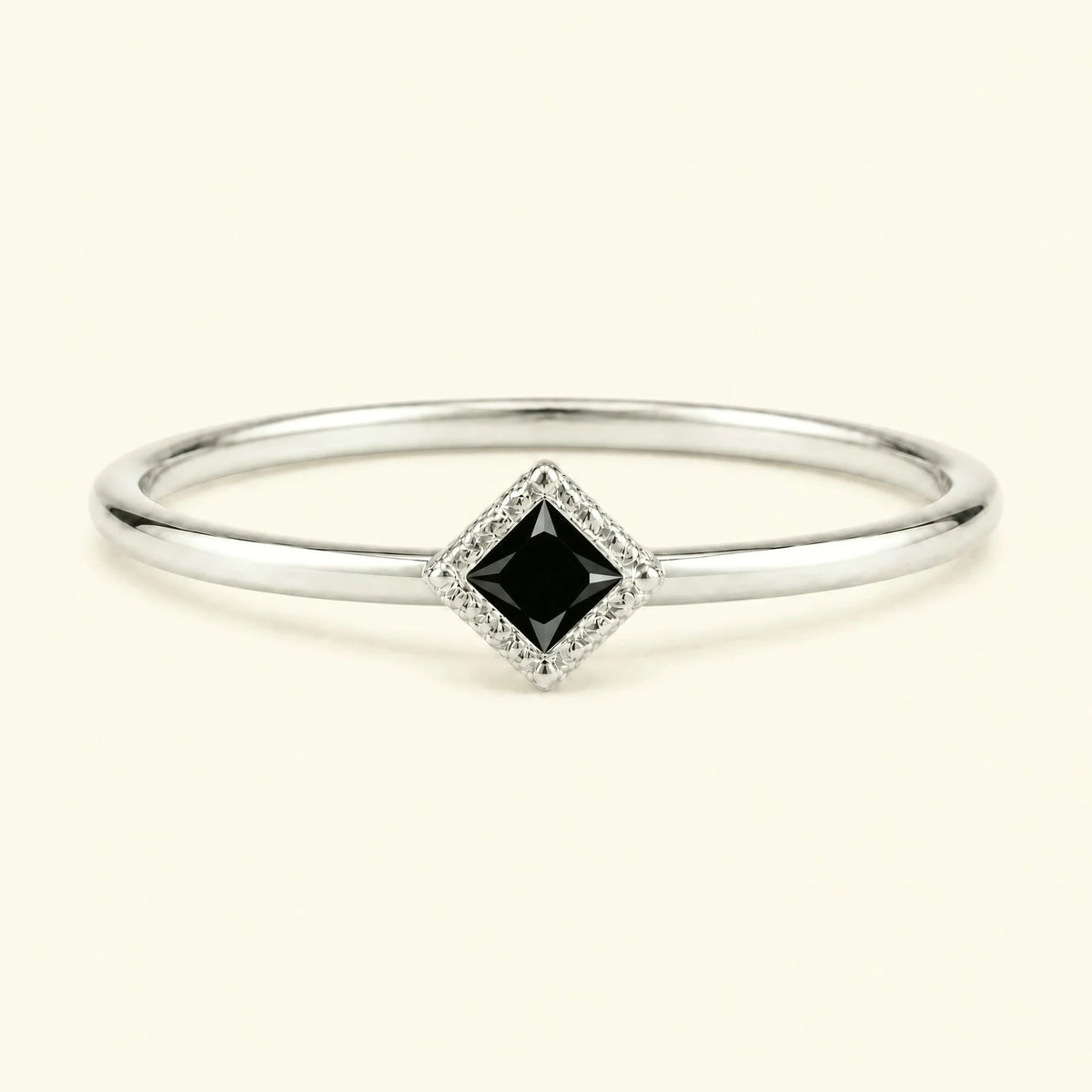 Indrani black diamond solitaire ring, 4mm princess twisted setting 18K white gold