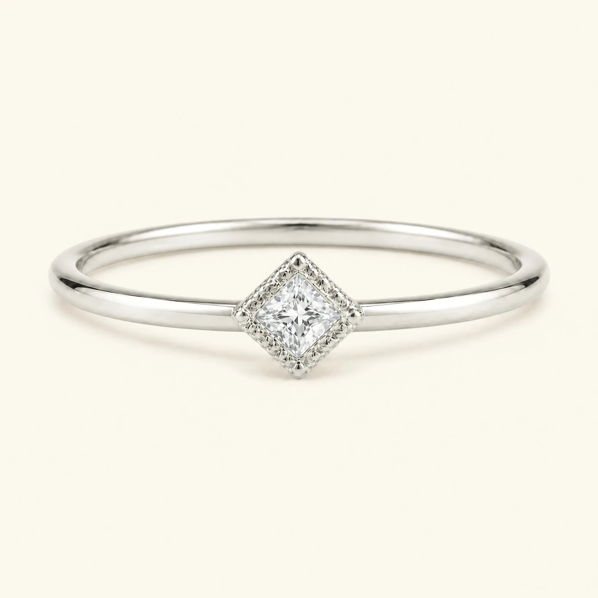 Vintage Indrani engagement ring — diamond solitaire princess cut 4 mm, square stone in twisted rope setting, 18K white gold