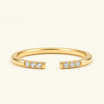 Open fine ring pavé set with white diamonds in yellow gold