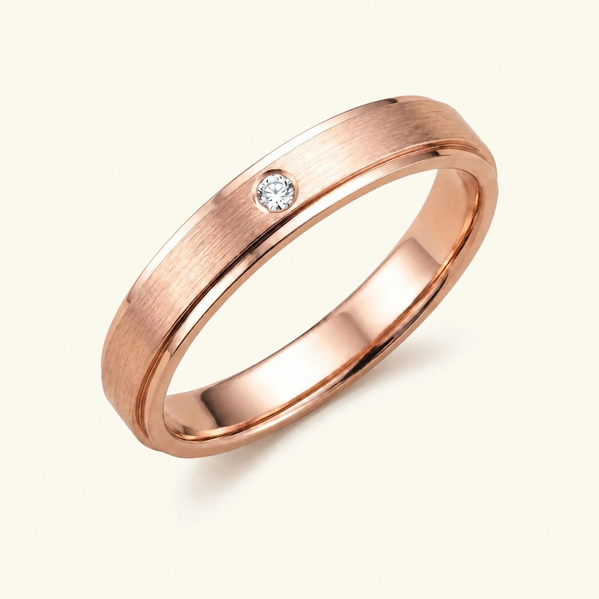 Dhruva diamond wedding band in 18k rose gold, brushed band bezel setting