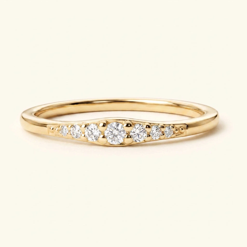 Nisha and Sushma wedding rings in 18ct Yellow Gold set with diamonds by Mayuri