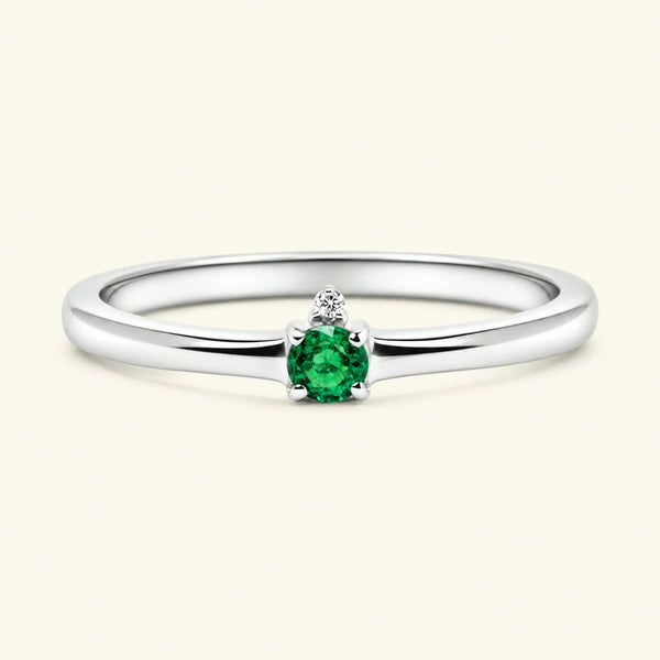 Bague de fiançailles solitaire émeraude en or blanc