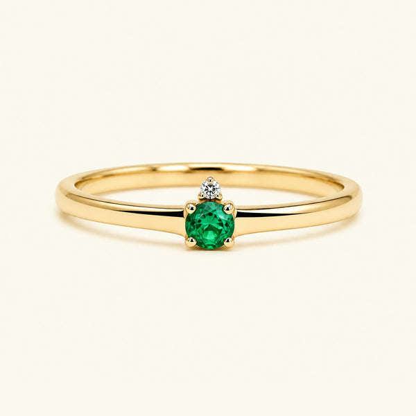 Bague de fiançailles solitaire émeraude en or jaune