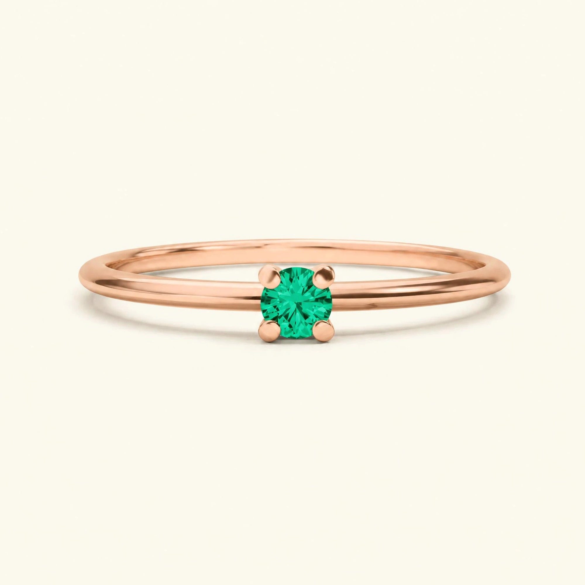 Bague Saral en or rose sertie d'une émeraude