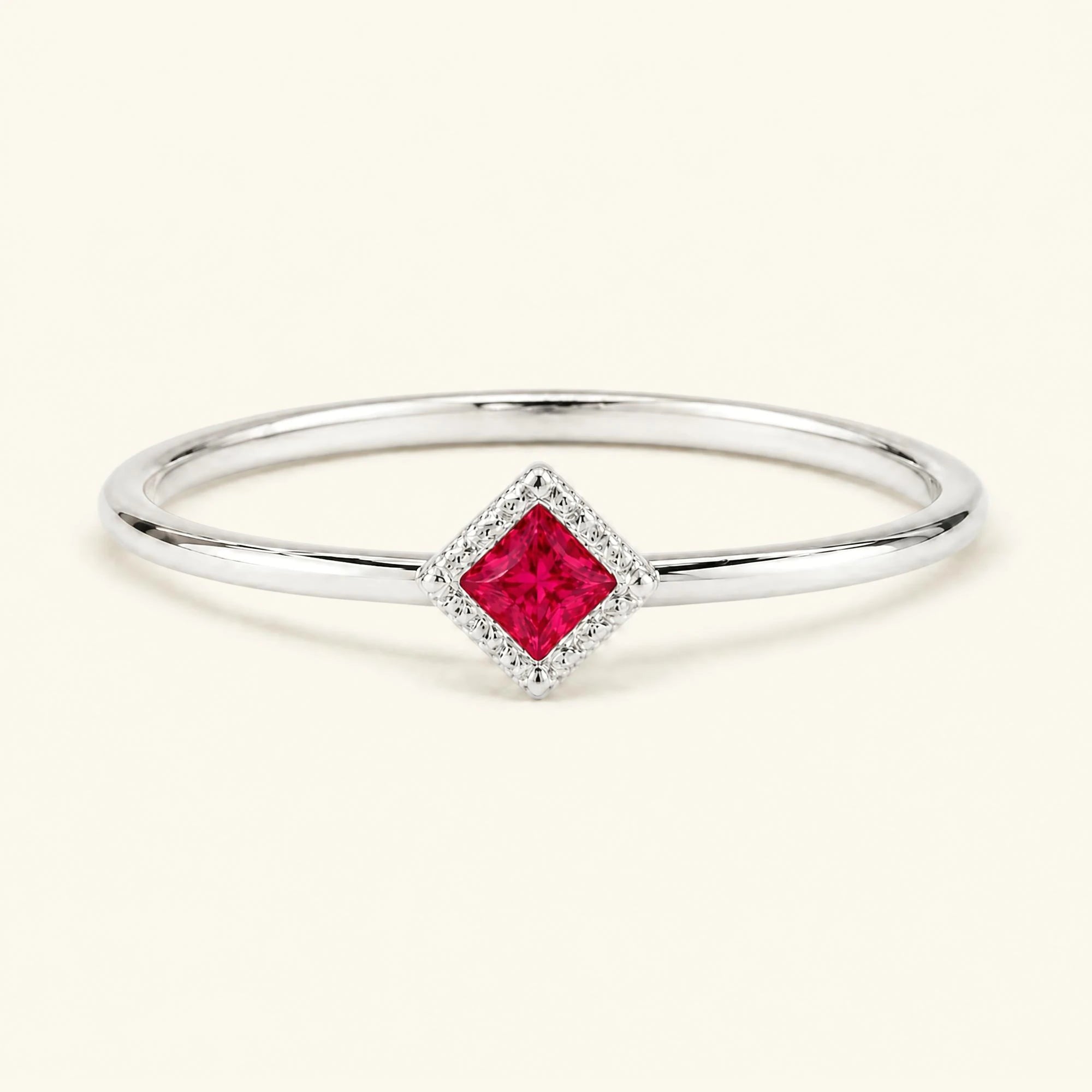 Vintage Indrani engagement ring — ruby solitaire princess cut 4 mm, square stone in twisted rope setting, 18K white gold