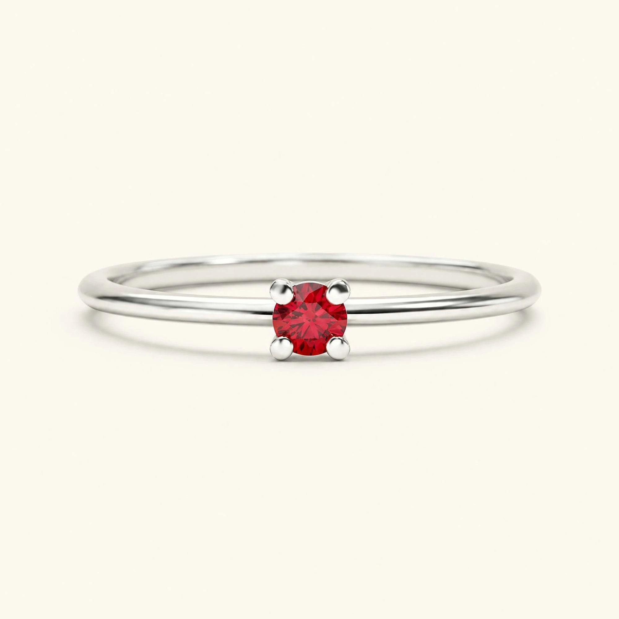 Ruby solitaire ring in 18K white gold