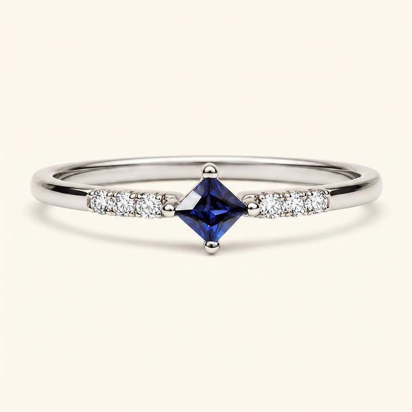 Princess engagement ring sapphire and diamonds in white gold