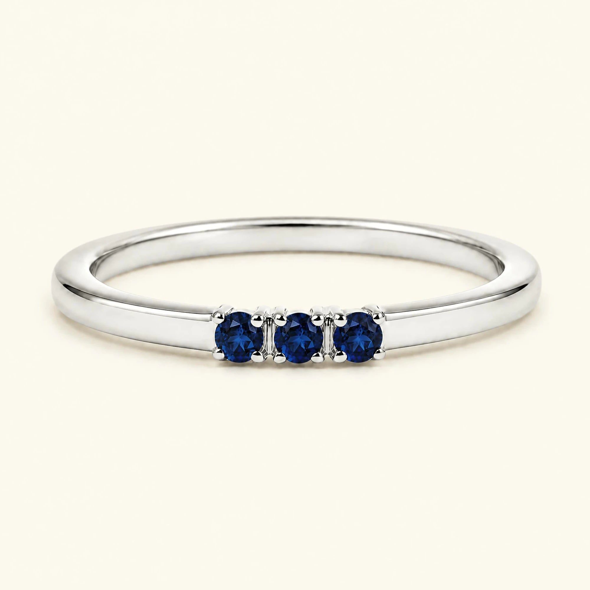 Sapphire trilogy engagement ring in white gold