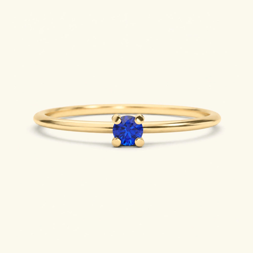 Blue Sapphire solitaire engagement ring, four-prong set in 18K yellow gold, Saral Mayuri design