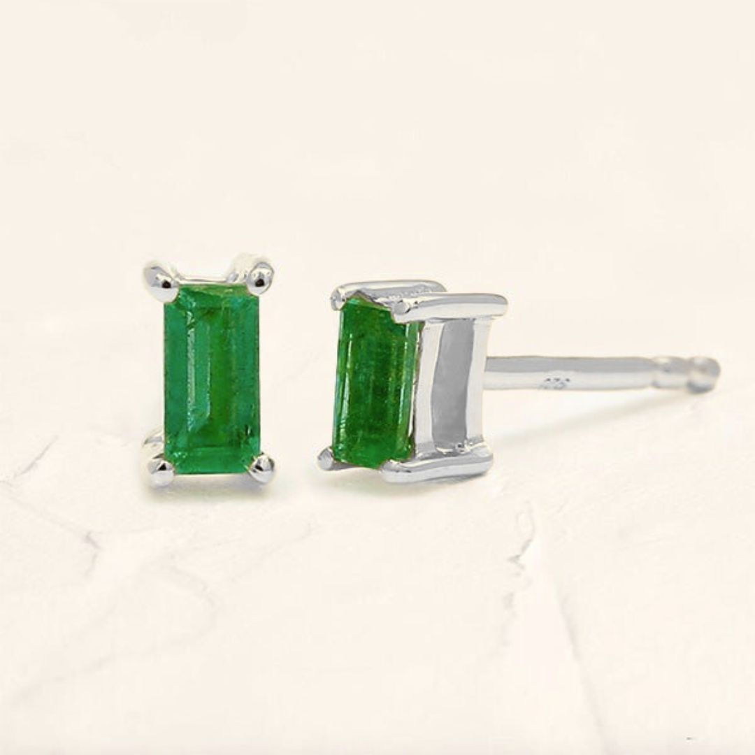 Shanti emerald baguette earrings in white gold