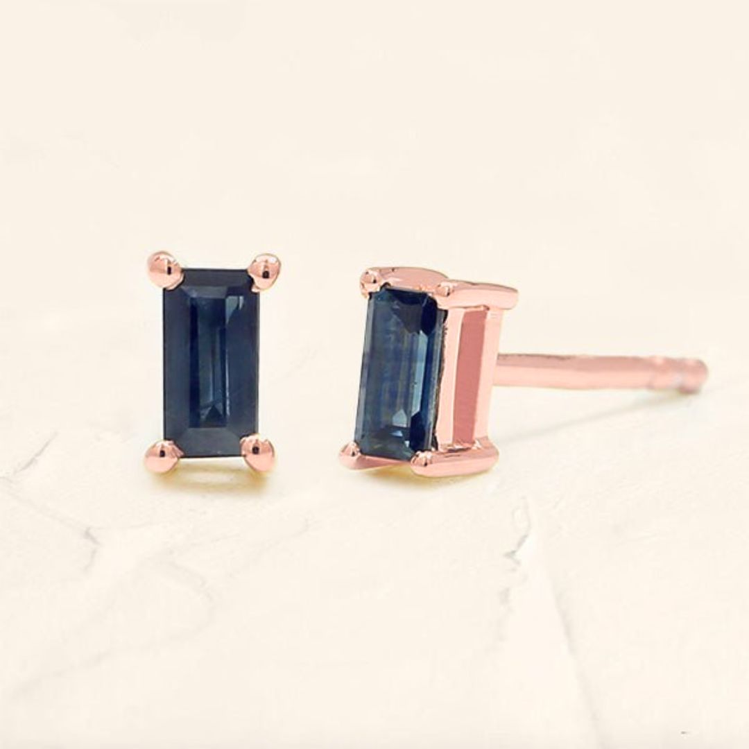 Sapphire solitaire baguette earrings in rose gold