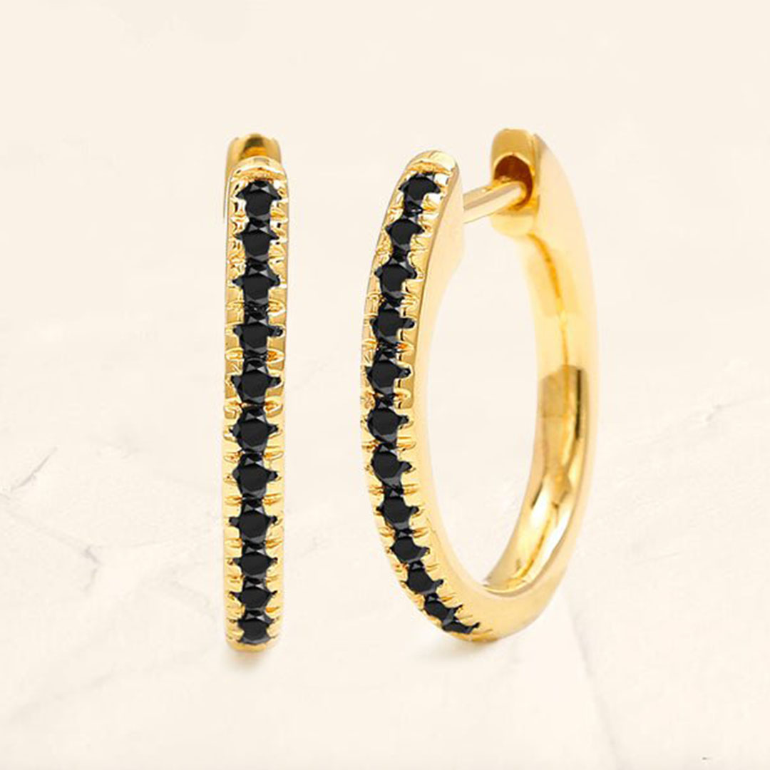 Créoles Ujala pavées de diamants noirs vue latérale