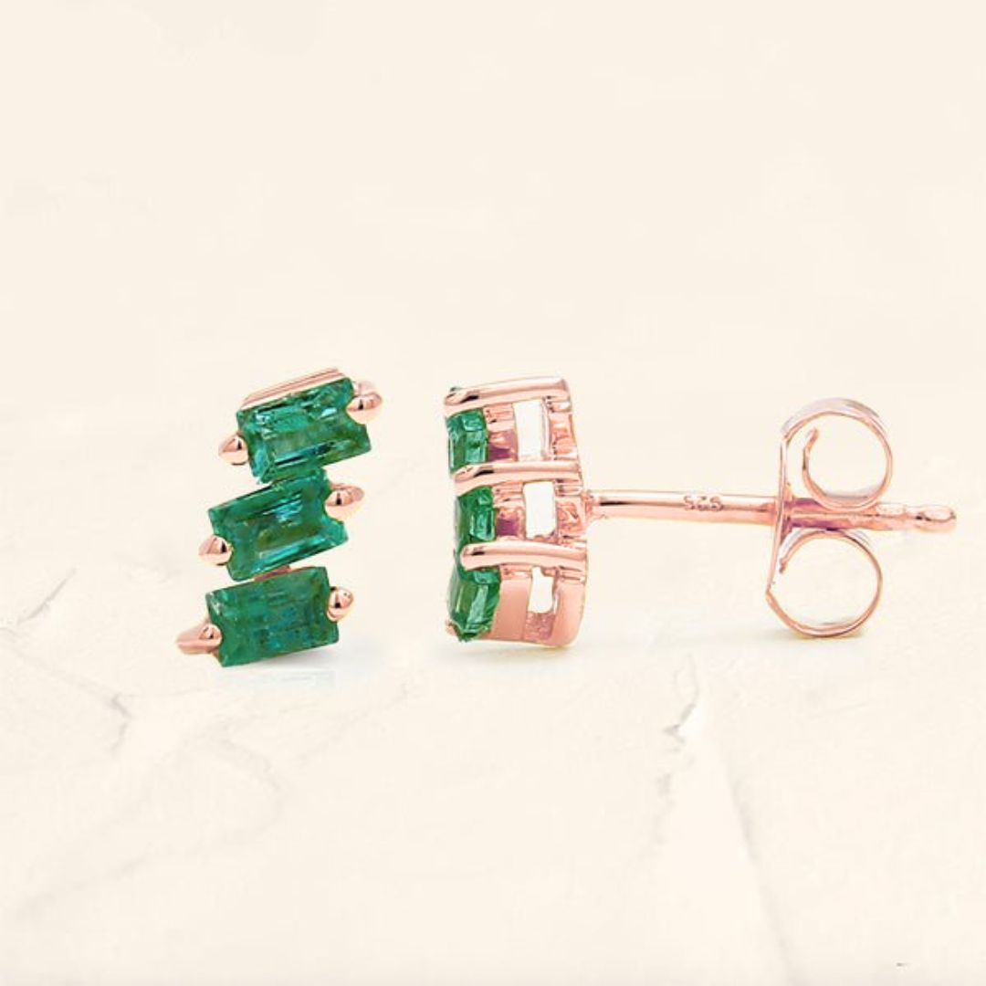 Jivane asymmetric emerald earrings in rose gold