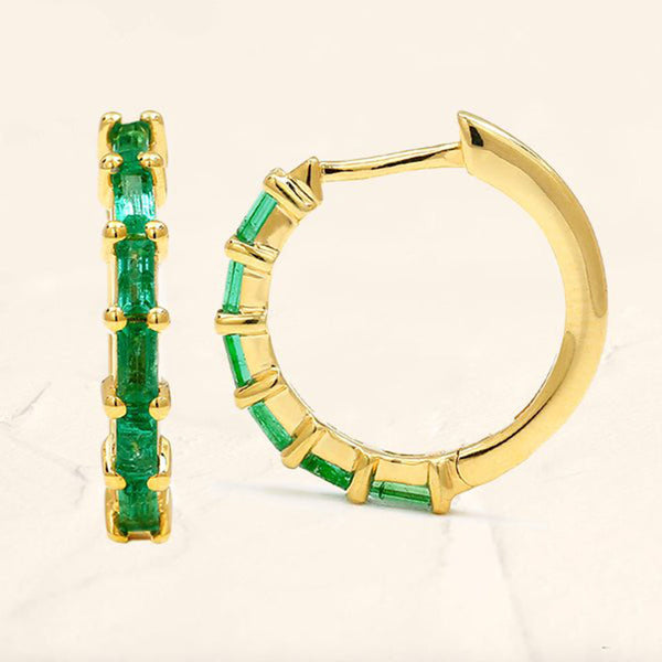 Yatra emerald hoop earrings in yellow gold