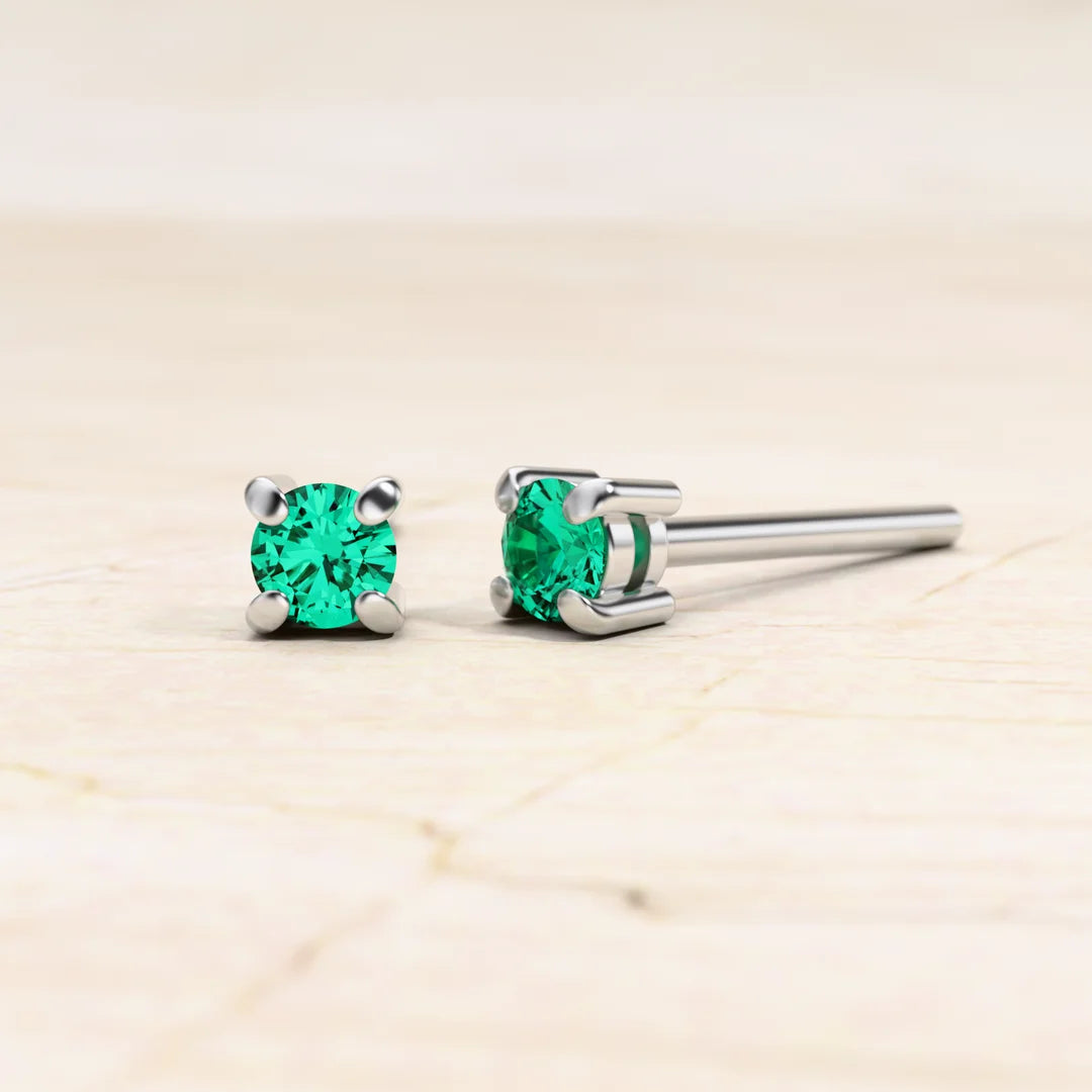 Solitaire emerald earrings in white gold Saral