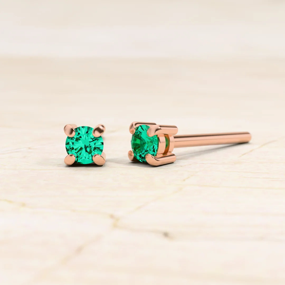 Solitaire emerald earrings in rose gold Saral