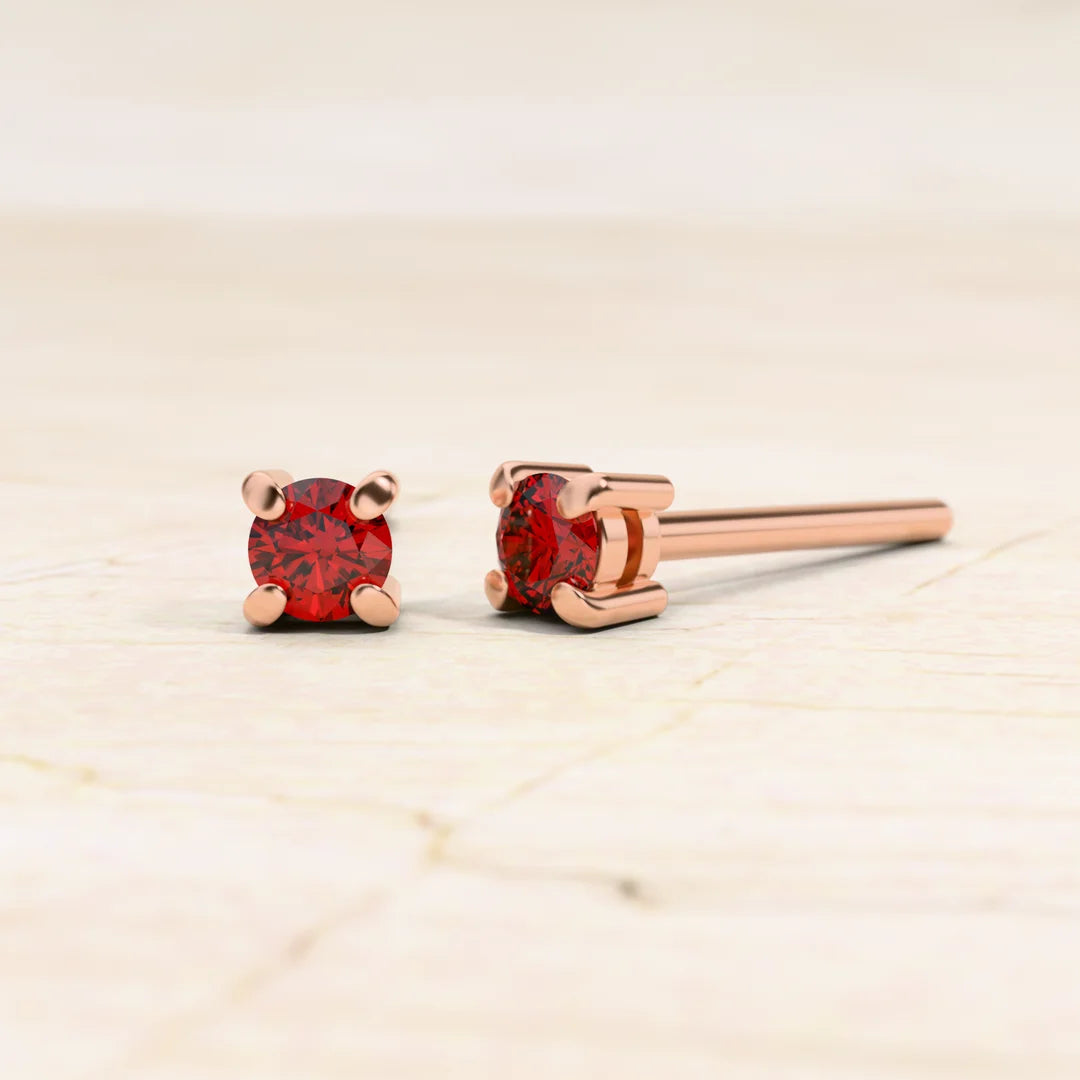 Solitaire ruby earrings in 18K rose gold