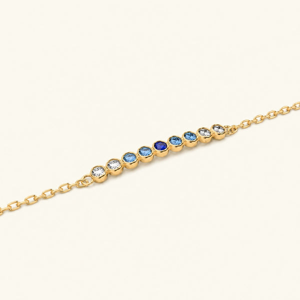 Noor yellow gold bracelet with horizon sapphire