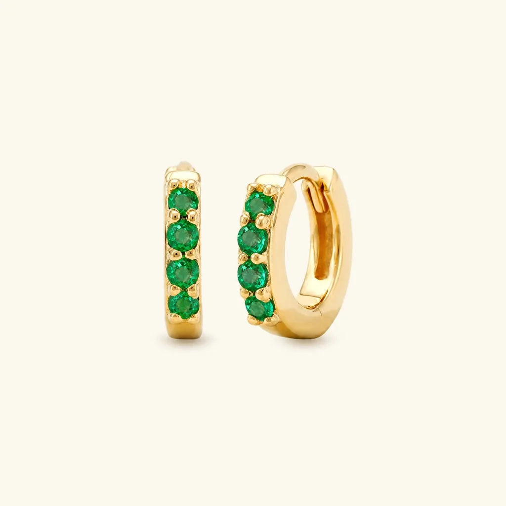 Sumitra huggie earrings in yellow gold set with four emeralds, a maid of honour gift