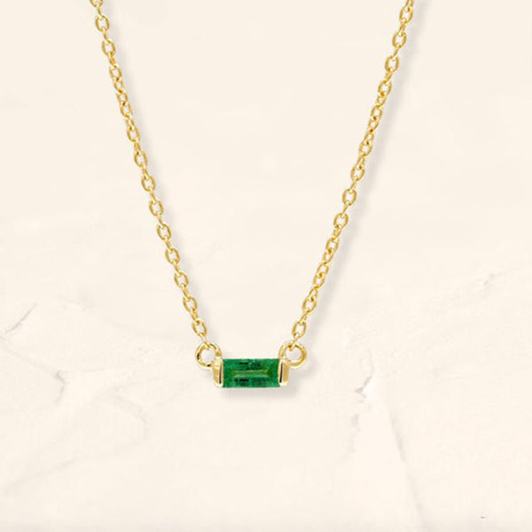 Shanti emerald baguette necklace in yellow gold