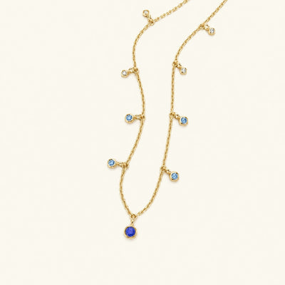 Megha yellow gold necklace with sapphire