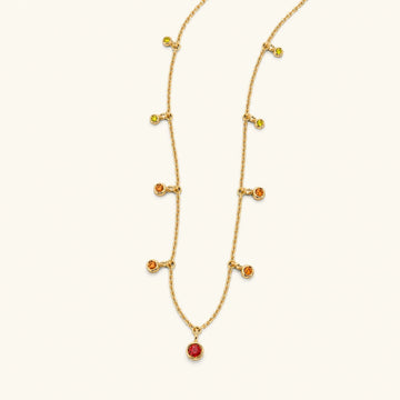 Megha yellow gold necklace with orange sapphire