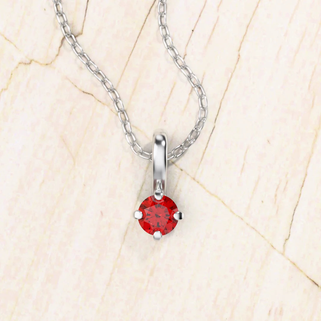 Saral ruby solitaire necklace in white gold