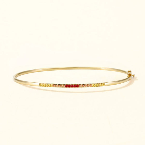 18-carat gold bangle Tarang sapphire sunset