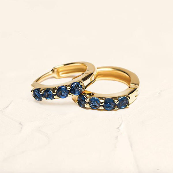Sumitra hoop earrings with natural sapphires in vermeil gold