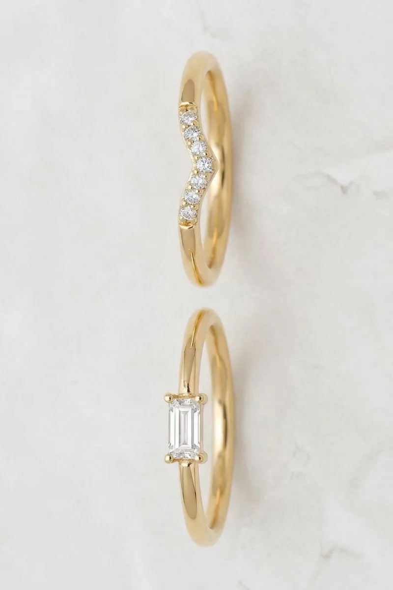 Solitaire diamond ring and diamond pave wedding ring in 18K yellow gold