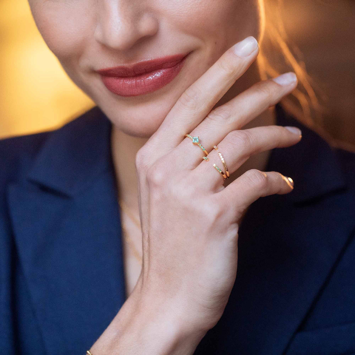 combination of diamond pavé ring and emerald rings