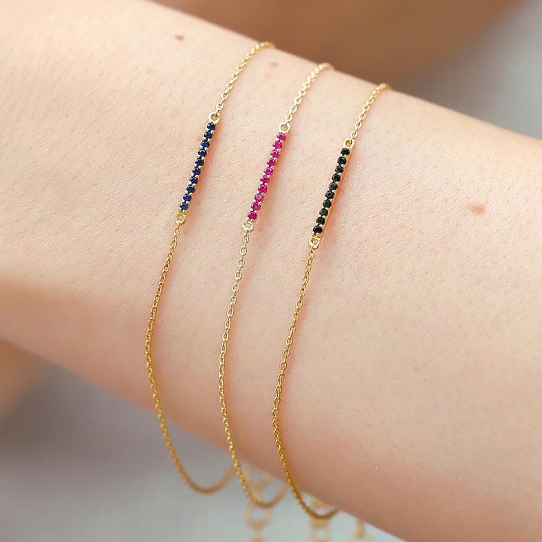 Trois bracelets longues barres en pierre précieuse