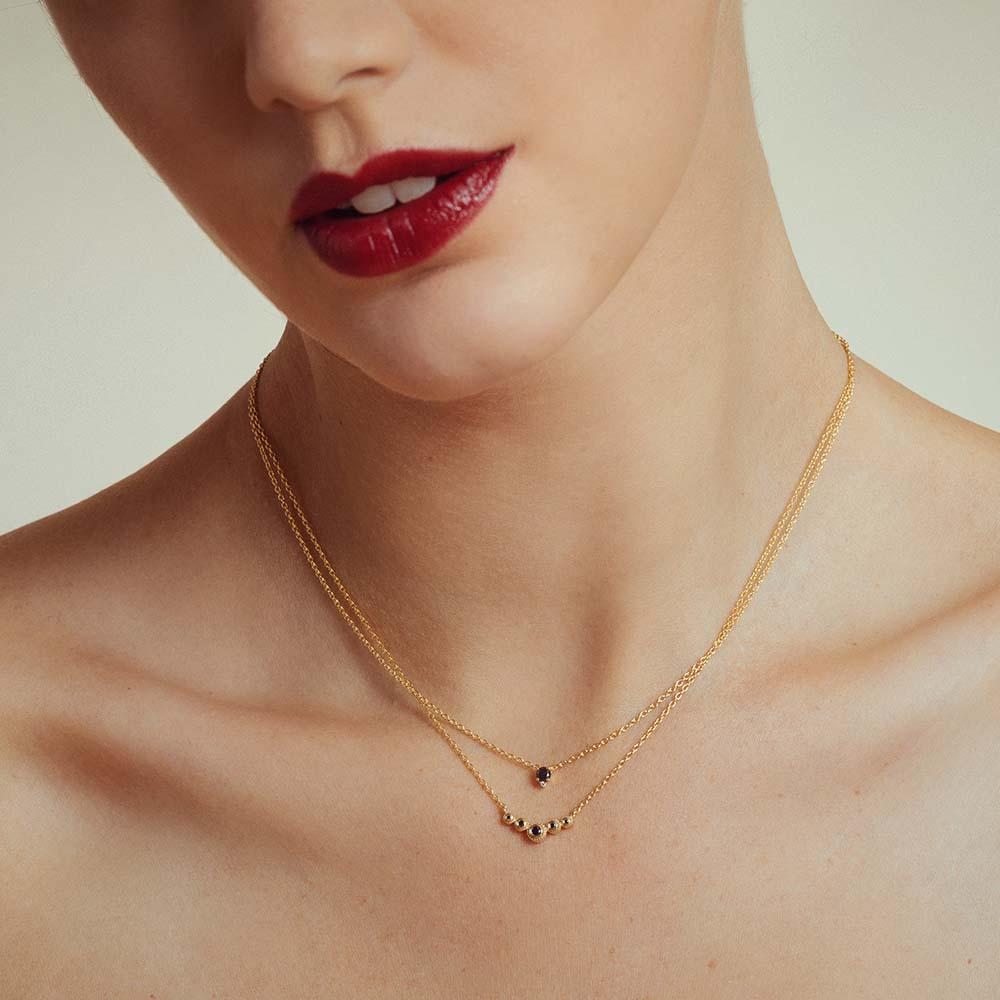 Collier en diamant noir et diamant superposé